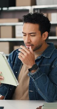 Scrolling, stress and tablet with man in logistics office for feedback or problem solving. App, shipping and thinking with supply chain person in workplace for distribution error, fail or mistake