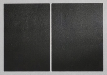 Fototapeta premium paper film frame sticker on white paper with two black rectangles, cool photo overlay.