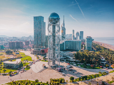 6 November 2025, Batumi, Georgia: city skyline featuring the Alphabetic Tower, modern buildings, and the Black Sea coast on a clear summer day