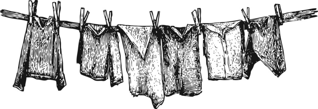 vintage hand drawn laundry hanging on clothesline with wooden clothespins and various garments