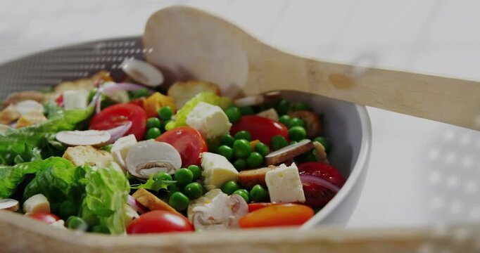 Dotted-map terminal text fading, bowl revealing salad and spoon, camera zooming or panning for clari