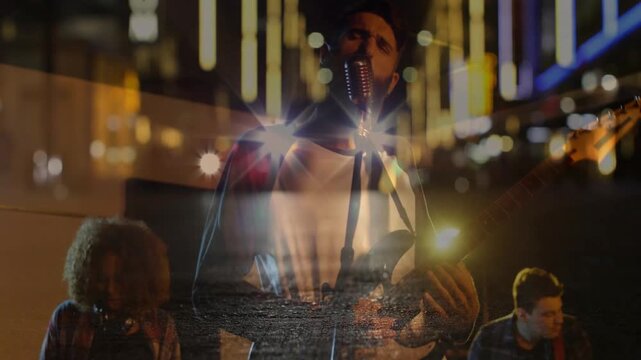 Vertical video: Camera pushing band singer forward, singing into mic for focus with light overlay