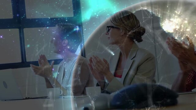 Center woman and team clapping in biz meeting responding to presenter as globe animating over them