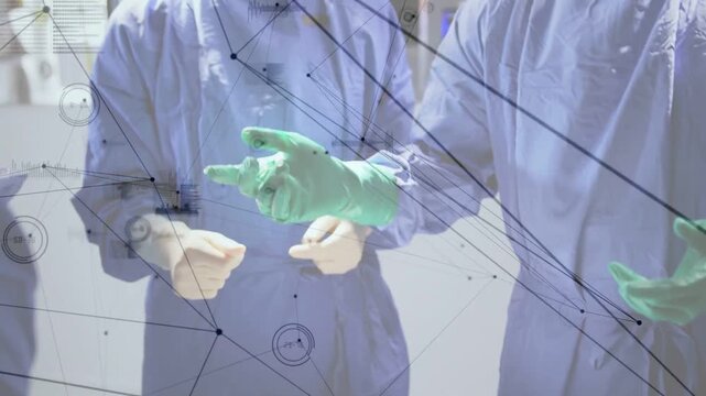 Surgical team aligning, donning sterile gloves as grid overlay tracking hands preparing surgery