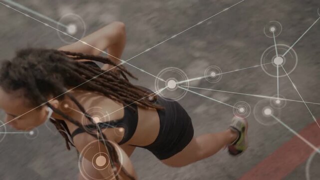 Female runner pushing off, speeding on redline lane while HUD mapping wrist chest head for fitness