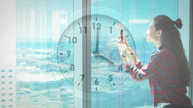 Woman leaning toward glass and tapping phone, framing skyline for design as clock graphic shifting
