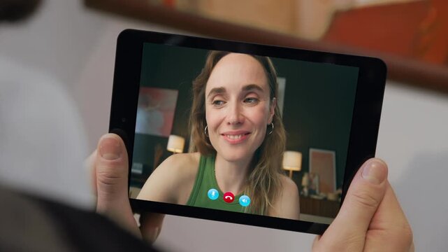 Flirting husband calling video chat in flat closeup. Wife talking tablet online