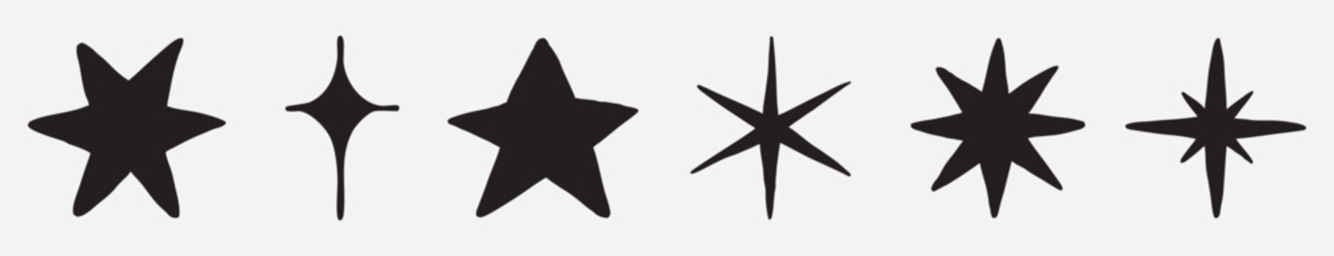 A series of six black star shapes, each with unique designs. The stars vary in form, showcasing different star designs. Black stars on a white background. Doodle star set.
