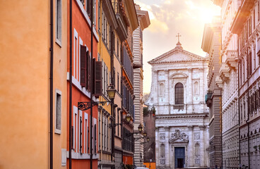Rome, Italy. View at church Santa Susanna during sunset. Picturesque citycape in old historic district. Facade with entrance of antique temple.