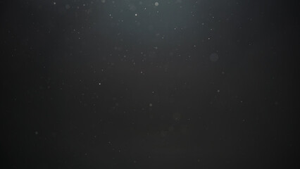 Obraz premium Real dust particles floating in air over dark background