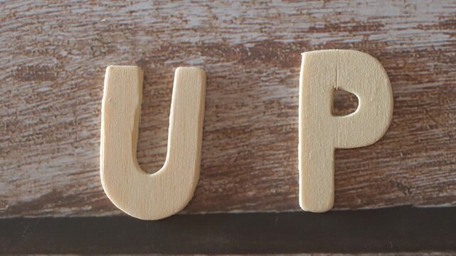 wooden letters writing up zoom in text