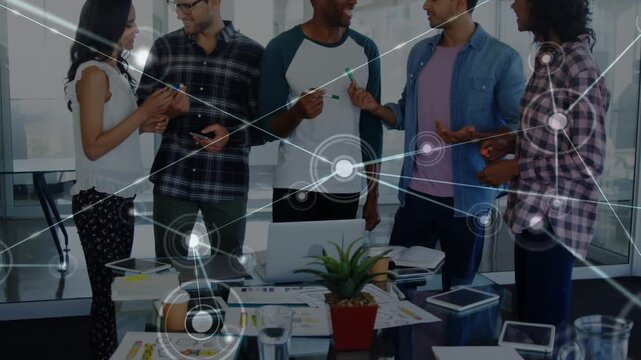 Animation of network of connections with icons over diverse business people using vr headsets
