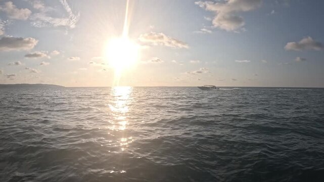 Scenic boat ride to Drake Bay with lush rainforest coastline and blue ocean, relaxing travel footage Costa Rica