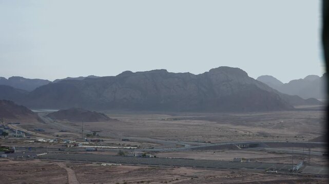 View of Jordan landscape from side of black hawk helicopter