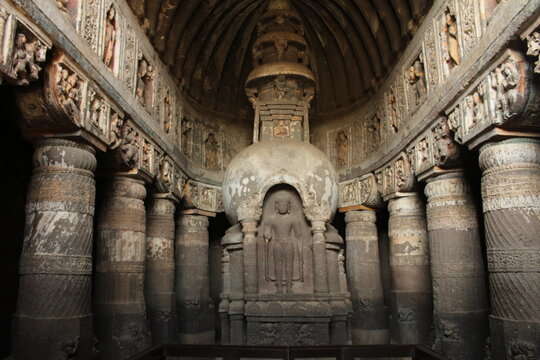 Ancient rock-cut cave temple architecture with detailed stone stone.