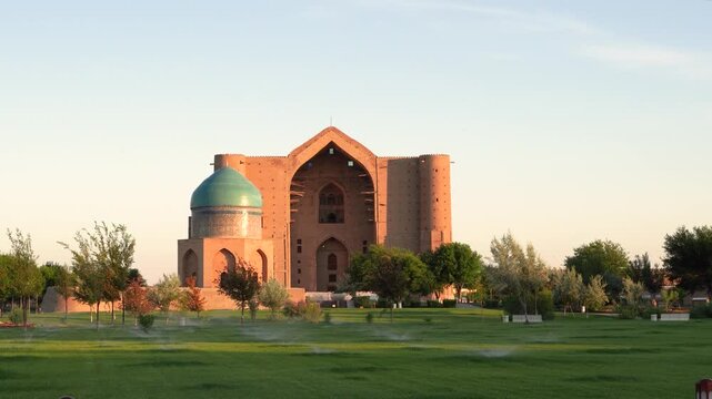 Turkestan, Kazakhstan - June 03, 2025: Scenic early morning sunrise view of the historical Mausoleum of Khoja Ahmed Yasawi (Қожа Ахмет Ясауи) and Rabia Sultan Begim Mausoleum complex 
