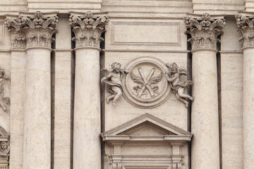 Fototapeta premium Sant'Andrea della Valle Basilica Facade Detail with Sculpted Columns and Angels in Rome, Italy