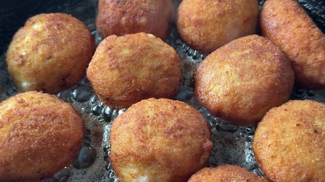 Cutlets are fried in a pan in oil.