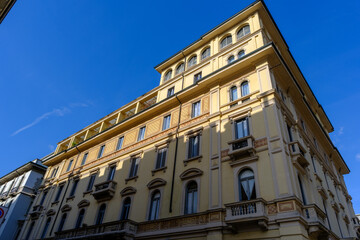 Obraz premium Old residential building along Via Leopardi in Milan, Italy