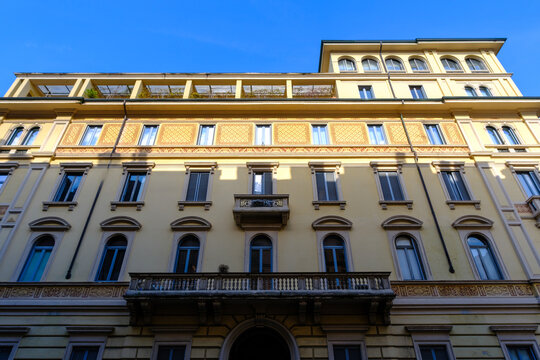 Old residential building along Via Leopardi in Milan, Italy