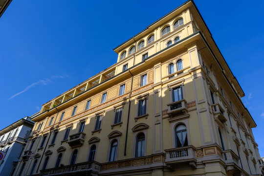 Old residential building along Via Leopardi in Milan, Italy