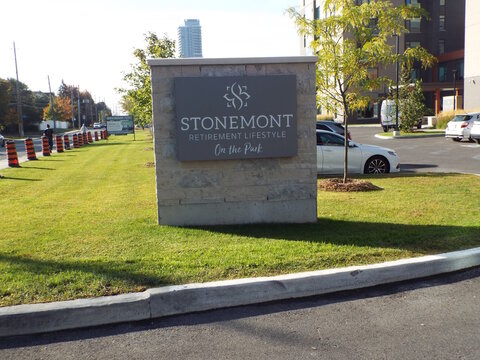 Ottawa, Ontario, Canada &ndash; July 25, 2025: A stone monument sign for "Stonemont Retirement Lifestyle" On the Park stands at 1068 Cummings Avenue.
