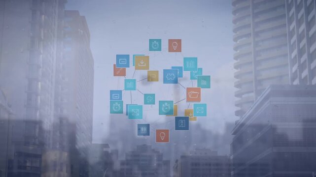 Composite video of globe of digital icons spinning against tall buildings