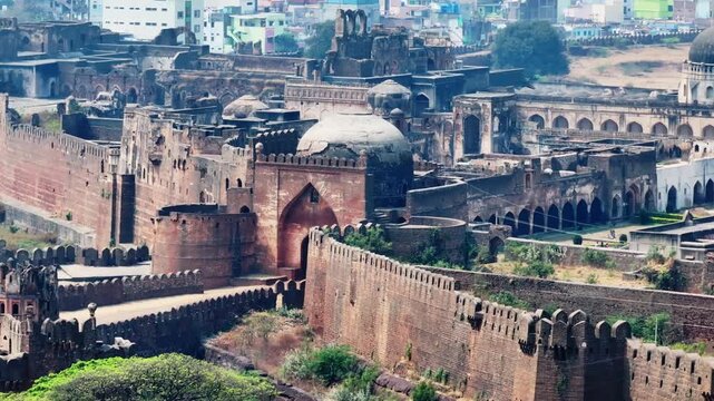 Closeup shot of bidar fort with Gumbaz Dharwaza and trees at karnataka, india. day time, push back shot, drone shot, 4k.