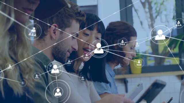 Animation of network of connections with people icons over diverse business people with tablets