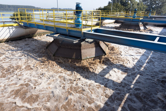 Wastewater treatment plant aeration basin with rotating clarifier and industrial water purification process