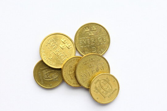Golden coins mix. Currency with value 5 and 10 Swedish crowns.