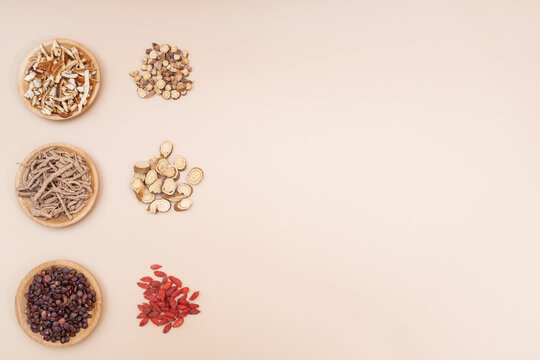 Six types of traditional Chinese medicinal herbs arranged flatly on a neutral background