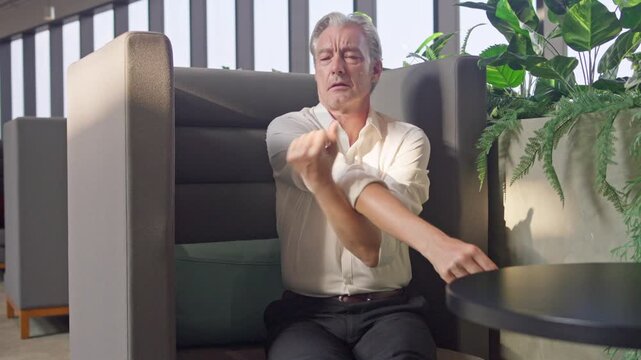 Stretching exercises for office workers modern workspace video tutorial bright environment informative viewpoint