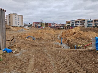 Obraz premium Underground water pipeline distribution system installed during residential housing development construction project