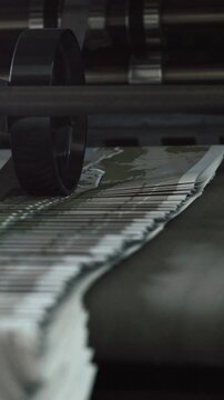 Printing Process - polygraph industry - brochures moving on the conveyor belt