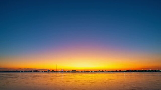 This stunning aerial photograph showcases Nakhon Phanom&rsquo;s illuminated skyline at twilight, with sparkling reflections dancing on the Mekong River. A perfect of serene nightlife landscapes in Thailand
