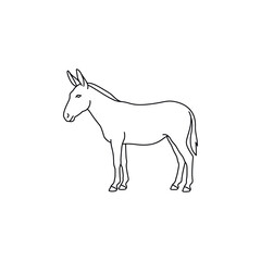 Fototapeta premium Donkey standing alone in profile view.