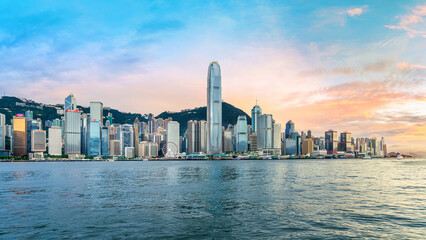 Fototapeta premium Scenic of Victoria harbor and Hong Kong city at sunset.