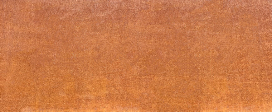 Rusty corroding metal surface creating weathered texture background