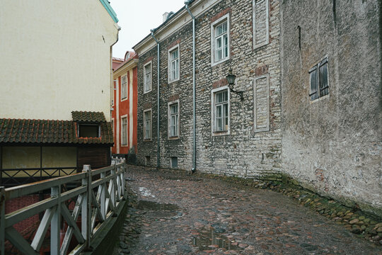 Historical buildings along a cobblestone street