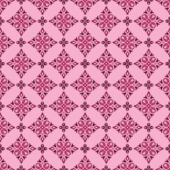 Fototapeta premium s A charming repeating design of dark pink floral diamonds set against a feminine pastel pink background.