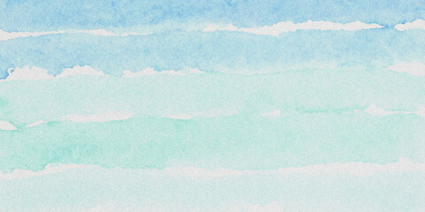 Fototapeta premium A serene landscape of a blue sky with white clouds over water