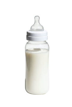 Baby bottle filled with fresh organic milk