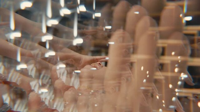 A happy young girl with red braids and a silver sparkly dress laughs and dances. The video has a fast, disorienting kaleidoscopic prism effect with glitter and light flares, creating a surreal feel