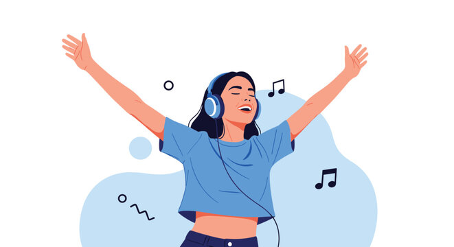 Energetic young woman wearing headphones and dancing joyfully with her arms raised while listening to favorite music.