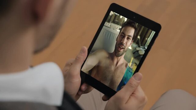 Online businessman tablet call friend at apartment closeup. Pool guy toasting