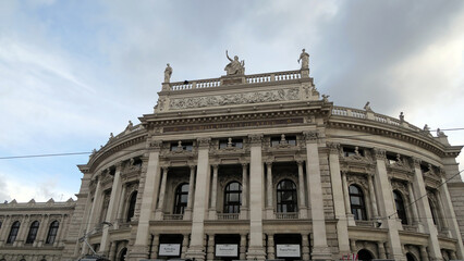 Fototapeta premium Vienna, Austria. The Burgtheater originally known as K.K. Theater an der Burg, then until 1918 as the K.K. Hofburgtheater, is the national theater.