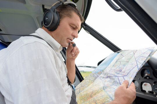 woman checking the map in the tarmac
