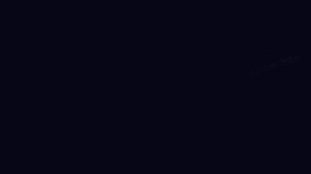 Colored sparks on a black background. Creating a visual effect with particles in an animation project using software tools and techniques
