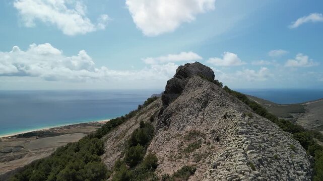 Aerial drone view reveal of Ilheu da Cal in Porto Santo island, Madeira, Portugal